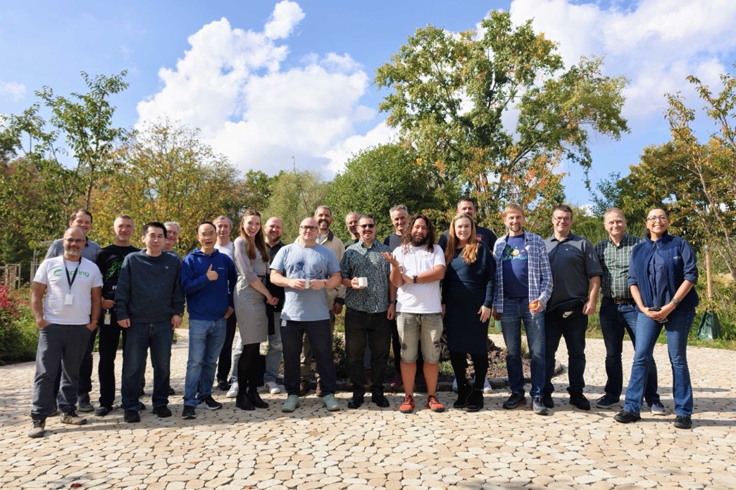 JCP Executive Committee members gathered outdoors at the face-to-face meeting in Walldorf